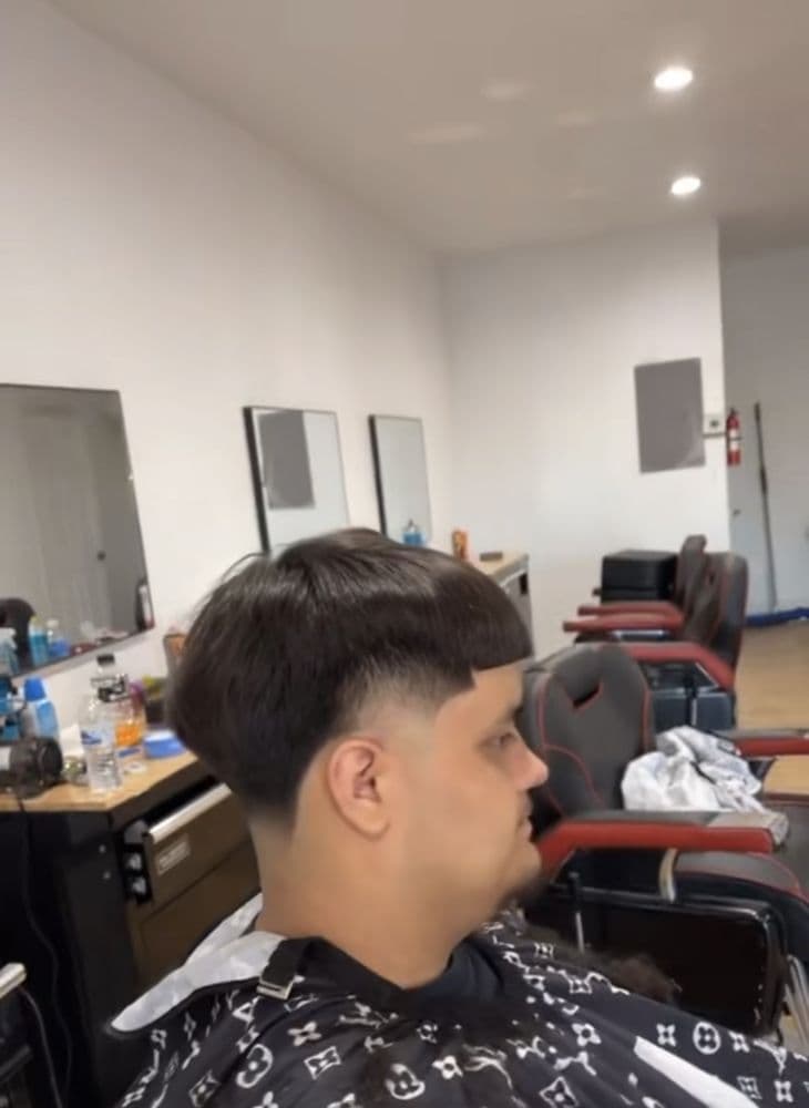 Burst fade with a clean shape-up at JayJ's Barber Shop